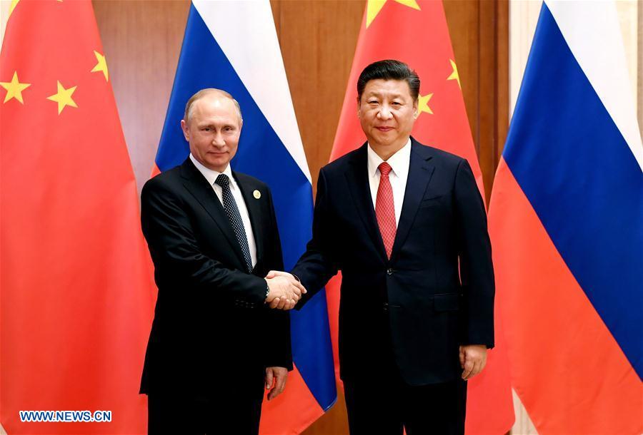 Xi says China, Russia play role of 'ballast stone' in world peace, stability