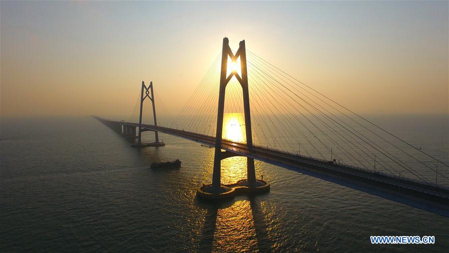 World's longest cross-sea bridge opens, integrating China's Greater Bay Area