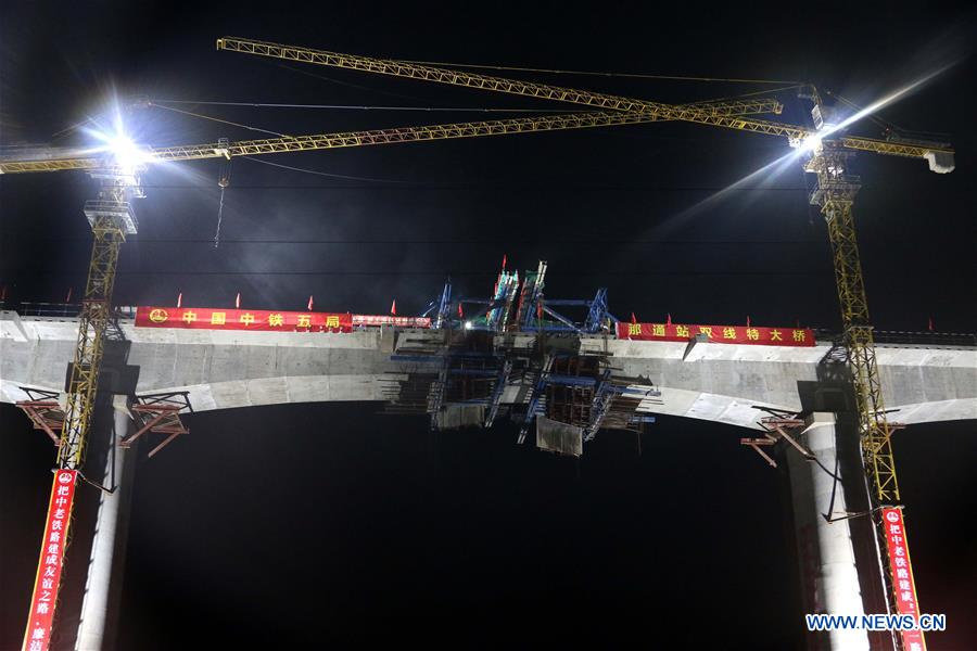 Chinese firm completes beam closure along China-Laos railway