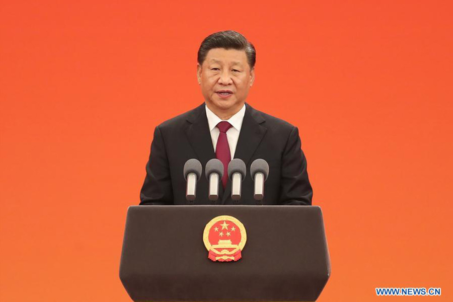 Xi confers highest state honors on individuals ahead of National Day