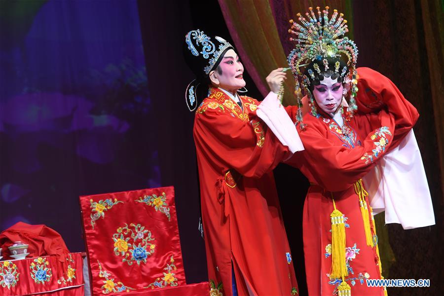 Chinese opera singers perform Cantonese opera in Singapore
