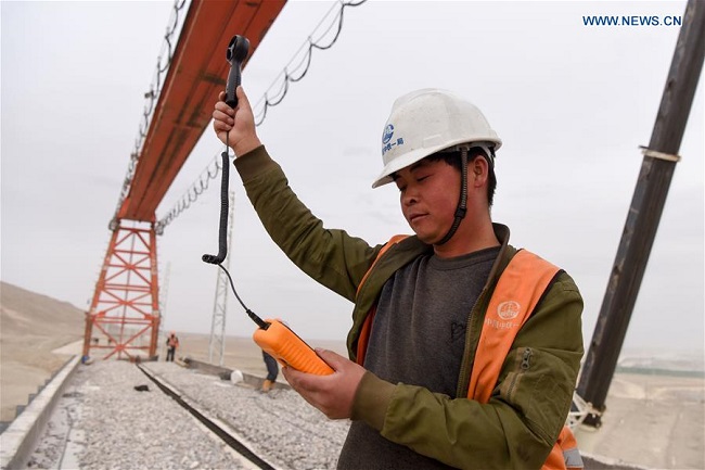 In pics: construction site of Golmud-Korla Railway in China's Xinjiang