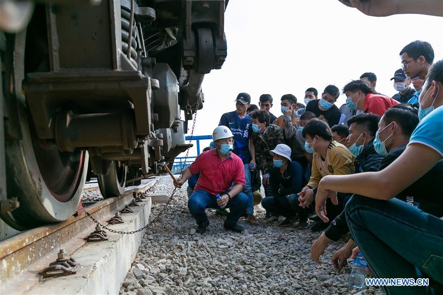 Lao train maintenance and driver trainees attend on-site teaching