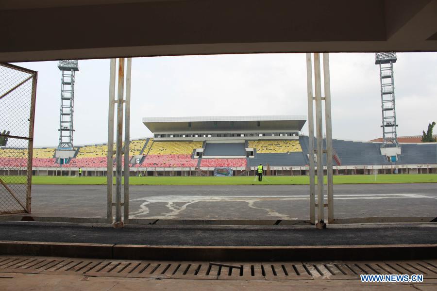 Beninese, Chinese workers work at renovation site of Friendship Stadium in Cotonou