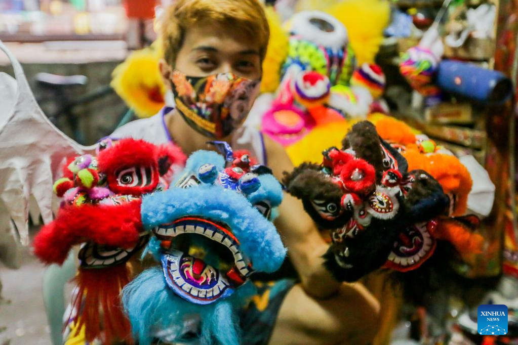 People create dragon, lion costumes for upcoming Chinese New Year in Manila