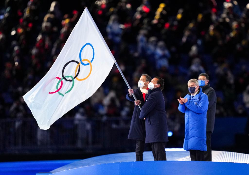 InPics: Olympic flag handed over to Milan-Cortina 2026 - BELT AND ROAD ...