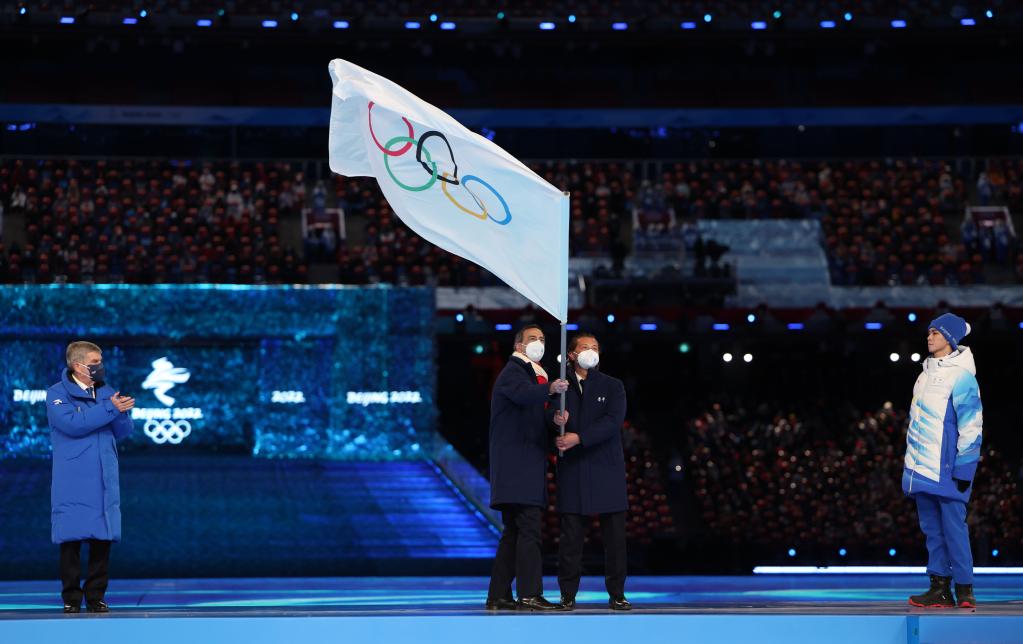 InPics: Olympic flag handed over to Milan-Cortina 2026 - BELT AND ROAD ...