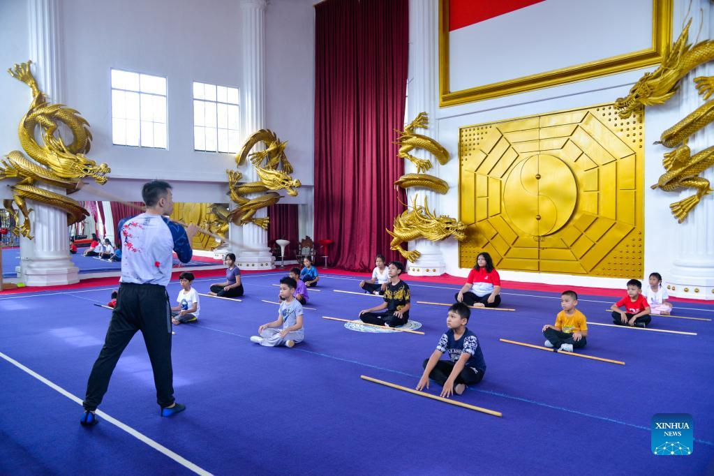 Children practice Chinese martial arts at Harmony Wushu Indonesia in Bogor