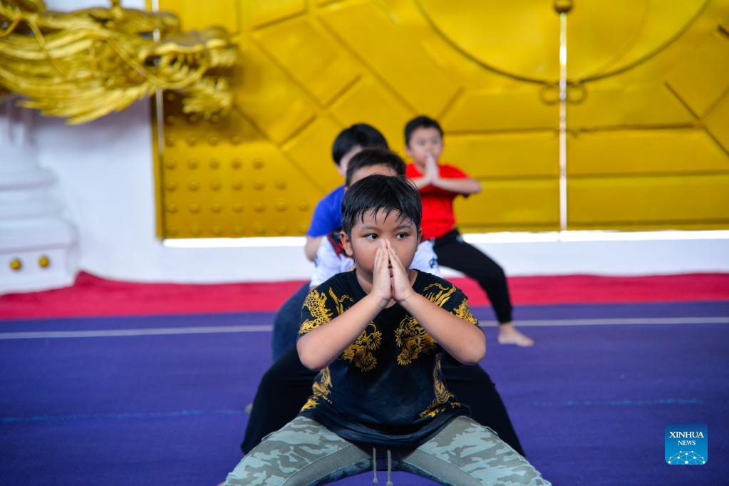 Children practice Chinese martial arts at Harmony Wushu Indonesia in Bogor