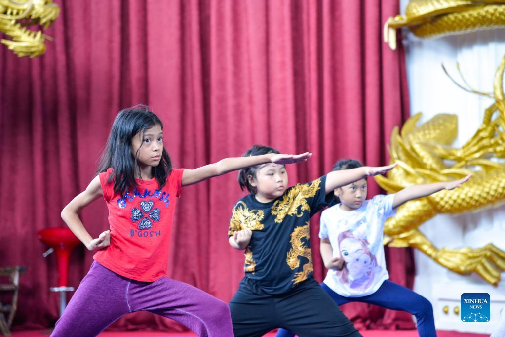 Children practice Chinese martial arts at Harmony Wushu Indonesia in Bogor