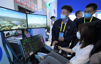 A visitor tries a flight simulator at the Fifth Silk Road International Exposition