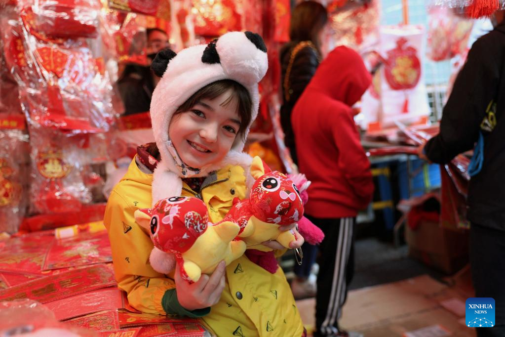 People visit Chinatowns to celebrate upcoming Chinese Lunar New Year in U.S.