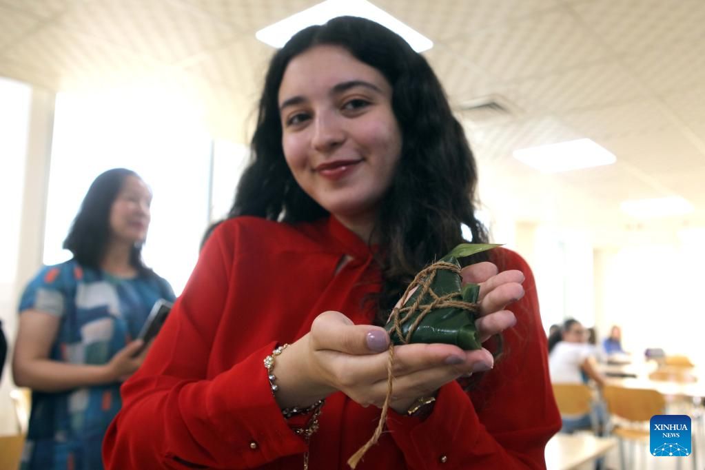 Students make Zongzi to celebrate Dragon Boat Festival in Amman, Jordan